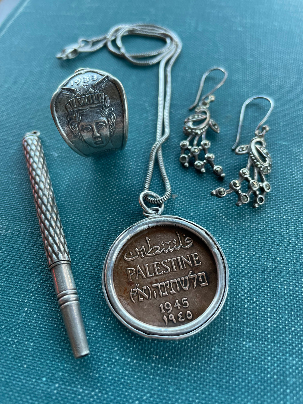 100% OF SALE TO OPERATION OLIVE BRANCH - Bundle #1: 1945 Palestine Coin Pendant Necklace, Marcasite Peacock Earrings, Small Sterling Pencil Pendant and 1933 Valkyrie World’s Fair Spoon Ring