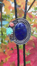 Load and play video in Gallery viewer, Amazing Bolo Tie in Sterling and Copper with Lapis Lazuli, Carved Turquoise and Vintage Coral
