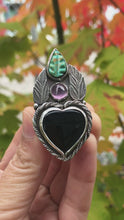 Load and play video in Gallery viewer, Dark Heart: Onyx, Purple Sapphire and Carved Turquoise Statement Ring. Adjustable Size
