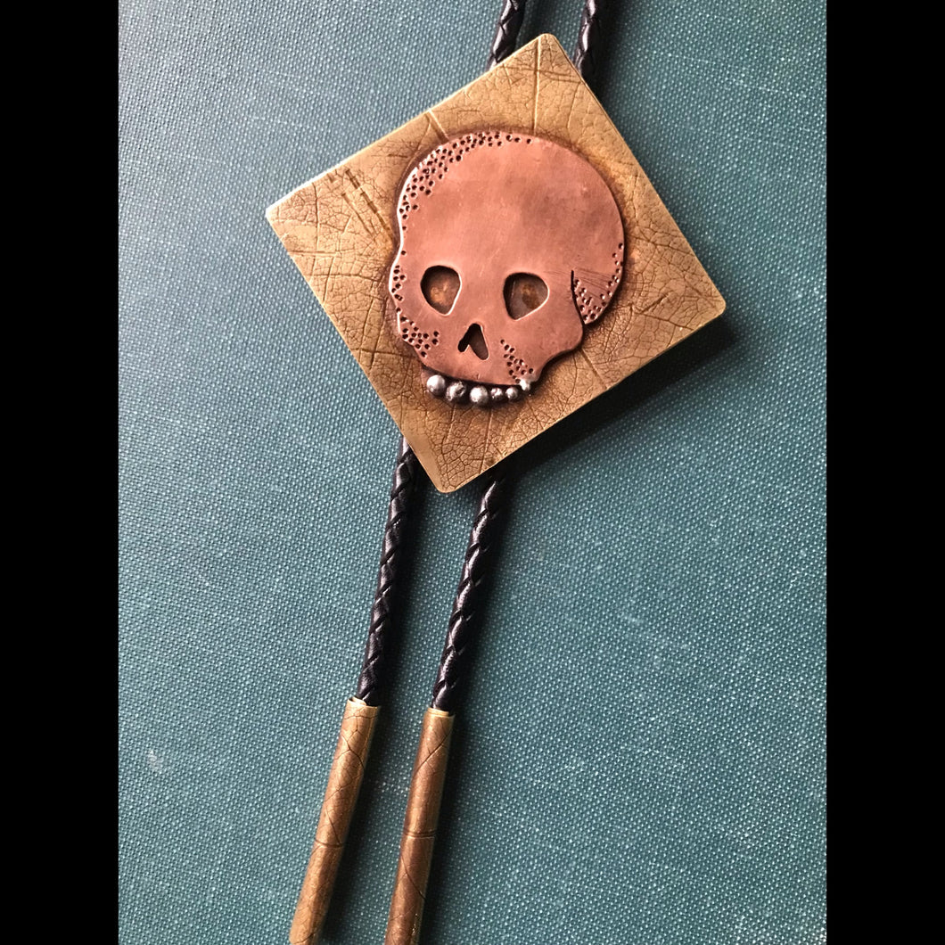 Memento Mori Skull Bolo Tie in Copper, Brass and Leather with Sterling Silver Teeth